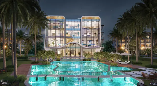 Clubhouse pool illuminated at night, Smartworld Orchard